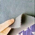 China atacado 100% poliéster dry fit tecido de lã para uso interno